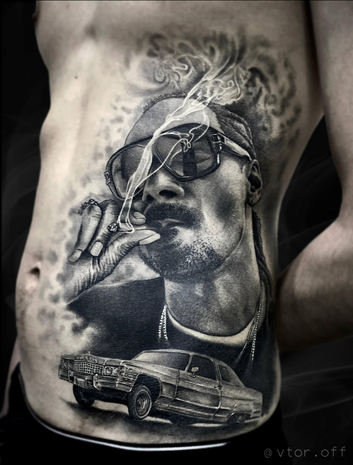 Untitled Igor Vtoroff | Realistic Snoop Dogg portrait tattoo with lowrider car in Chicano style. Torrevieja, Alicante, Spain.