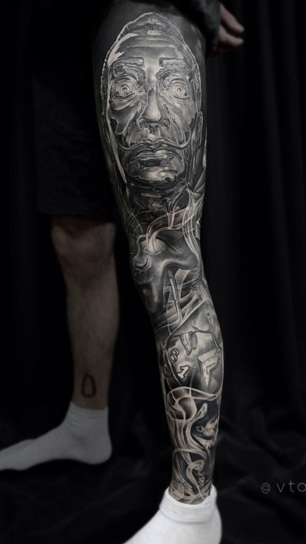 Untitled Full leg sleeve tattoo inspired by Salvador Dali artwork with smoke elements and dark graphics by Igor Vtoroff. Premium surrealism realism in Torrevieja, Alicante, Spain.