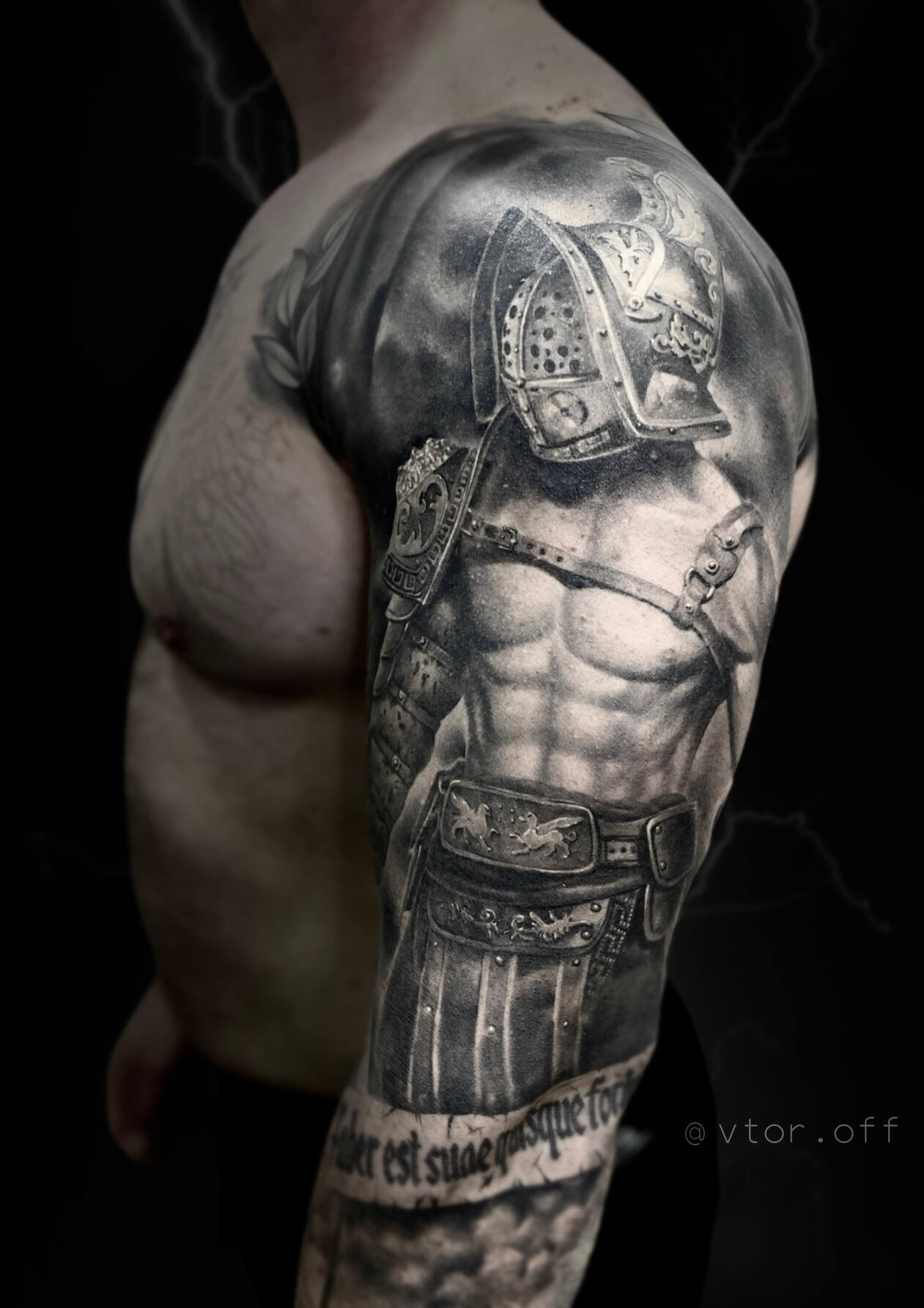 Untitled Realistic gladiator shoulder tattoo done by Igor Vtoroff. Custom black and grey warrior sleeve project, Torrevieja, Alicante, Spain.