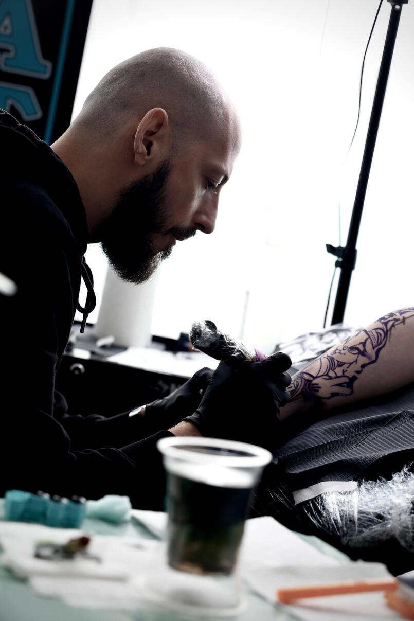Untitled Tattooer Igor Vtoroff during a session in Alicante (Torrevieja).