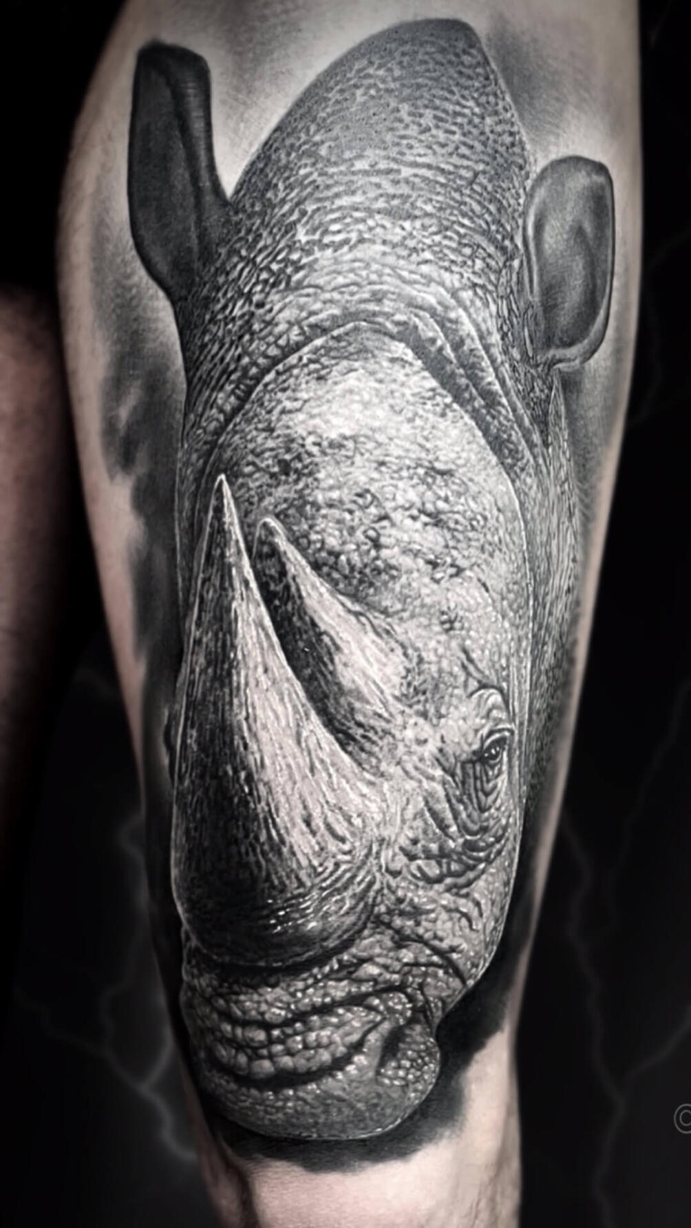 Untitled Igor Vtoroff | Realistic rhinoceros tattoo with detailed skin texture. Black and grey wildlife animal realism, Torrevieja, Alicante, Spain.