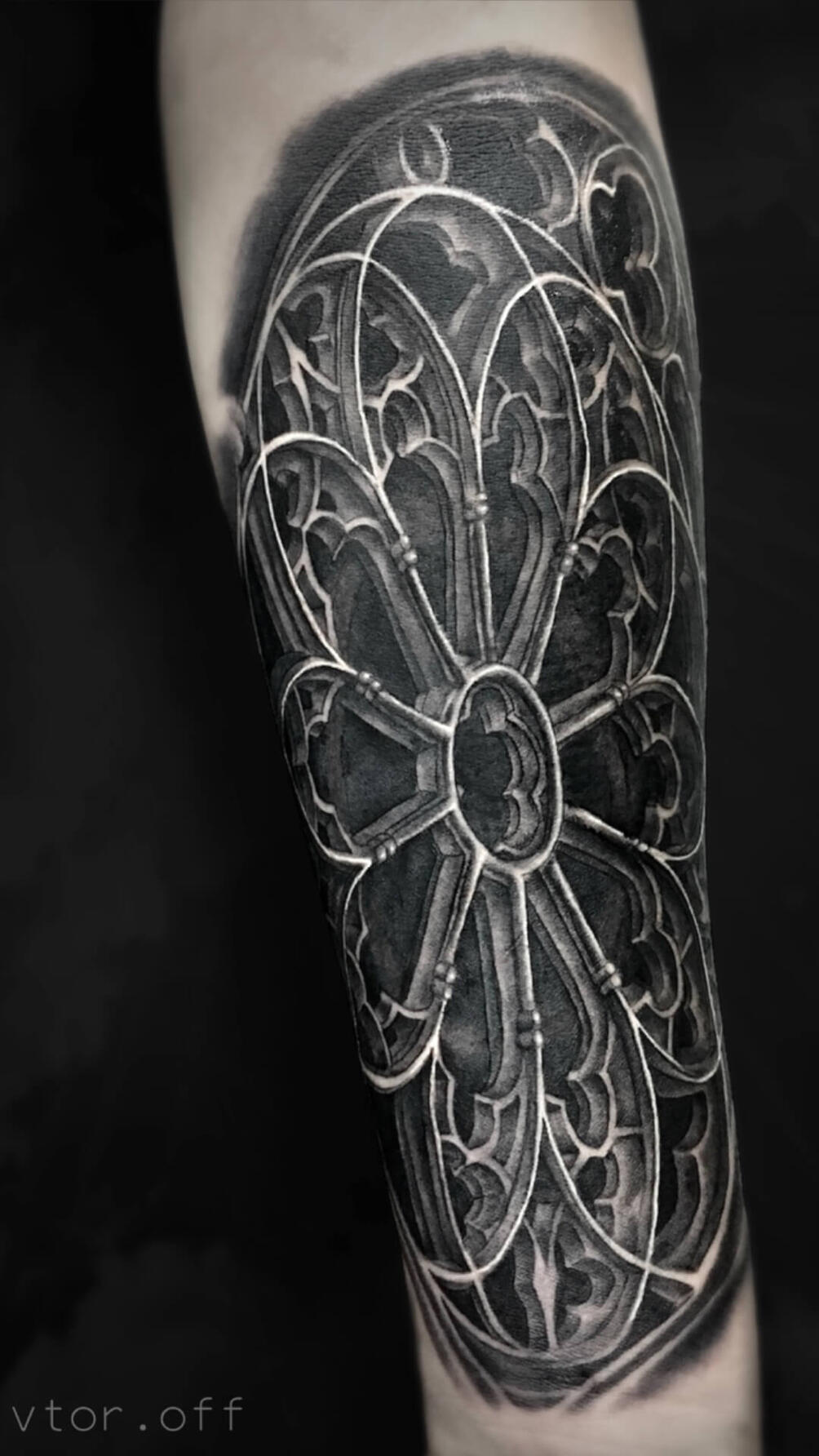 Untitled Igor Vtoroff | Realistic gothic rose window cathedral tattoo with detailed stone architecture. Black and grey realism, Torrevieja, Alicante, Spain.