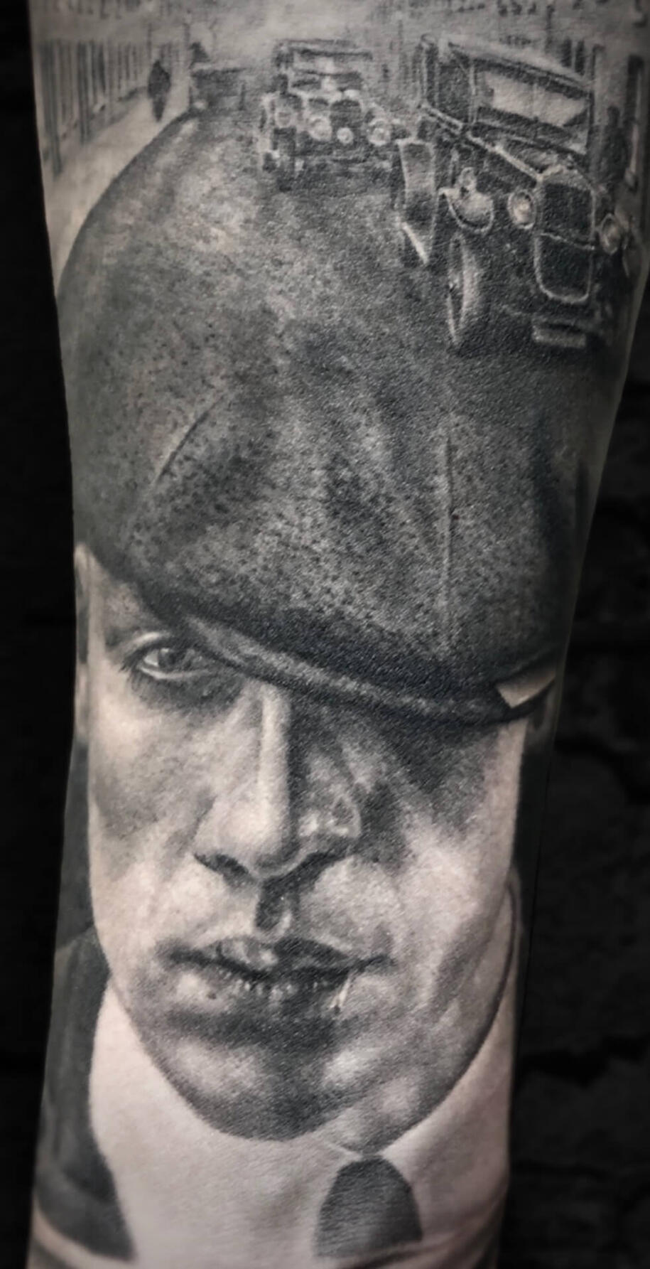 Untitled Igor Vtoroff | Realistic Thomas Shelby portrait tattoo from Peaky Blinders with vintage cars. Black and grey realism, Torrevieja, Alicante, Spain.
